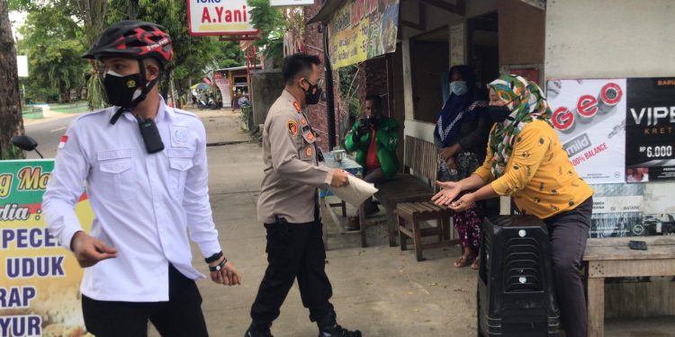 Bantu Warga Dampak COVID-19, Polres Pacitan Bagikan 5.000 Kilo Beras