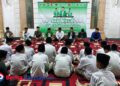 Kader Ansor, Banser, dan Banom NU Pacitan bersama Forkopimda menggelar istighotsah di Masjid Darul Falah, memanjatkan doa bersama untuk keselamatan bangsa dan daerah. (Foto: Sunardi Berita Pacitan).