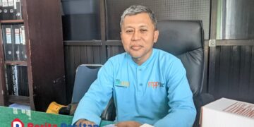 Endhit Yuniarso, S.T., M.T., Kepala Bidang Tata Bangunan dan Jasa Konstruksi Dinas PUPR Pacitan, saat ditemui di ruang kerjanya membahas progres pembangunan Gedung Sekolah Rakyat, Jumat 28/11/2025. (Foto: Sunardi/Berita Pacitan).