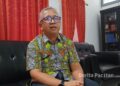 Kepala Dinas Perkimtan Pacitan, Heru Tunggul, saat memberikan keterangan terkait capaian program 3 juta rumah yang hingga kini baru satu yang memenuhi indikator BPHTB dan PBG di Pacitan, Kamis (16/4/2026). (Foto: Sunardi/Beritapacitan.com)